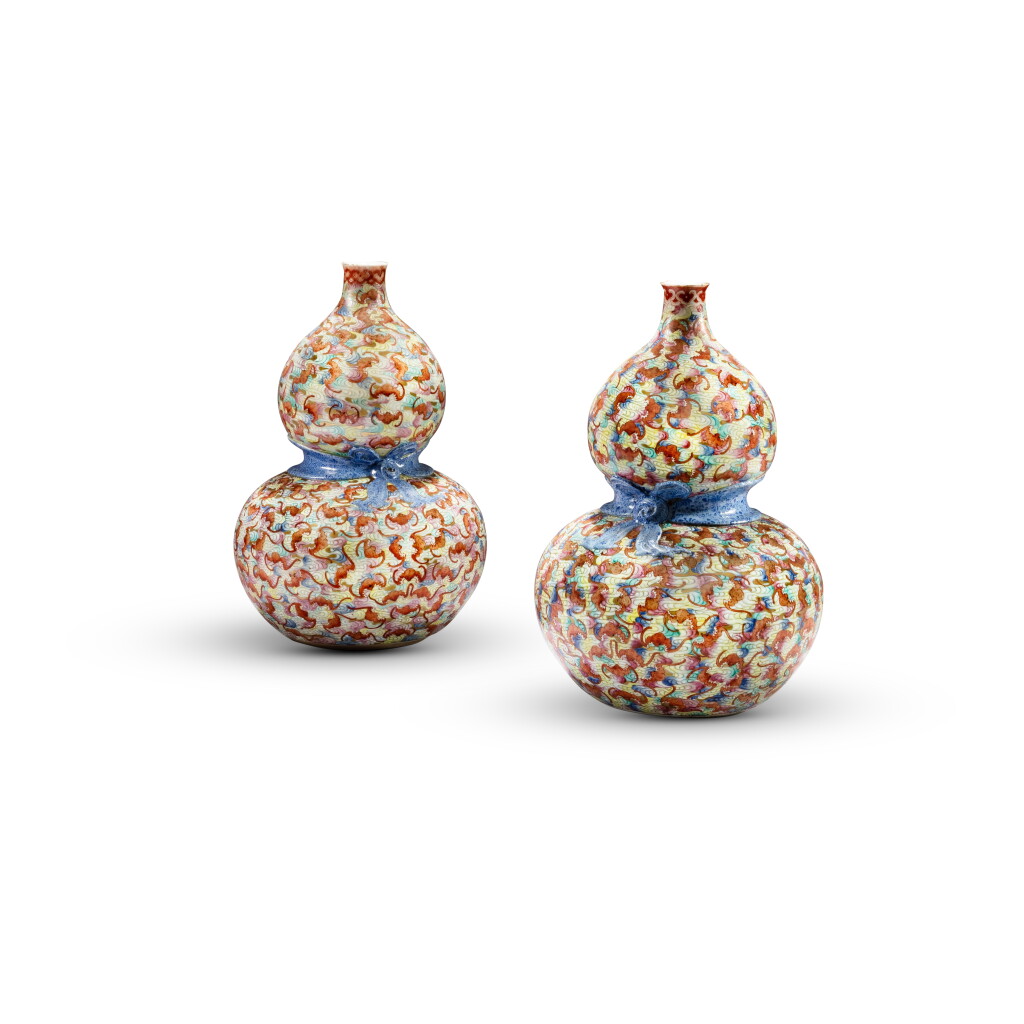 View full screen - View 1 of Lot 239. A pair of double gourd famille-rose 'bats and clouds' vases, Qing dynasty | 清 粉彩雲蝠紋葫蘆瓶一對.
