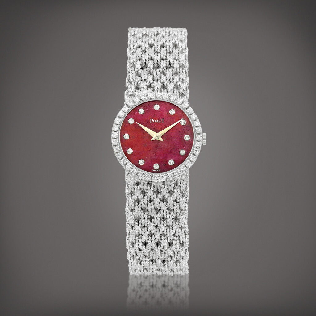 View full screen - View 1 of Lot 975. Reference 9706 N 39 | A white gold and diamond-set bracelet watch with rubellite dial, Circa 1970 | 伯爵 | 型號9706 N 39 | 白金鑲鑽石鏈帶腕錶,備紅碧璽錶盤,約1970年製.