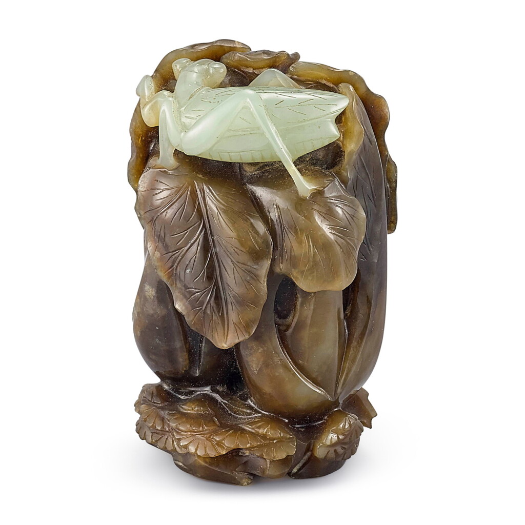 View full screen - View 1 of Lot 680. A CELADON AND BROWN JADE 'CABBAGE' GROUP QING DYNASTY | 清 青褐玉巧作富貴發財雕件.