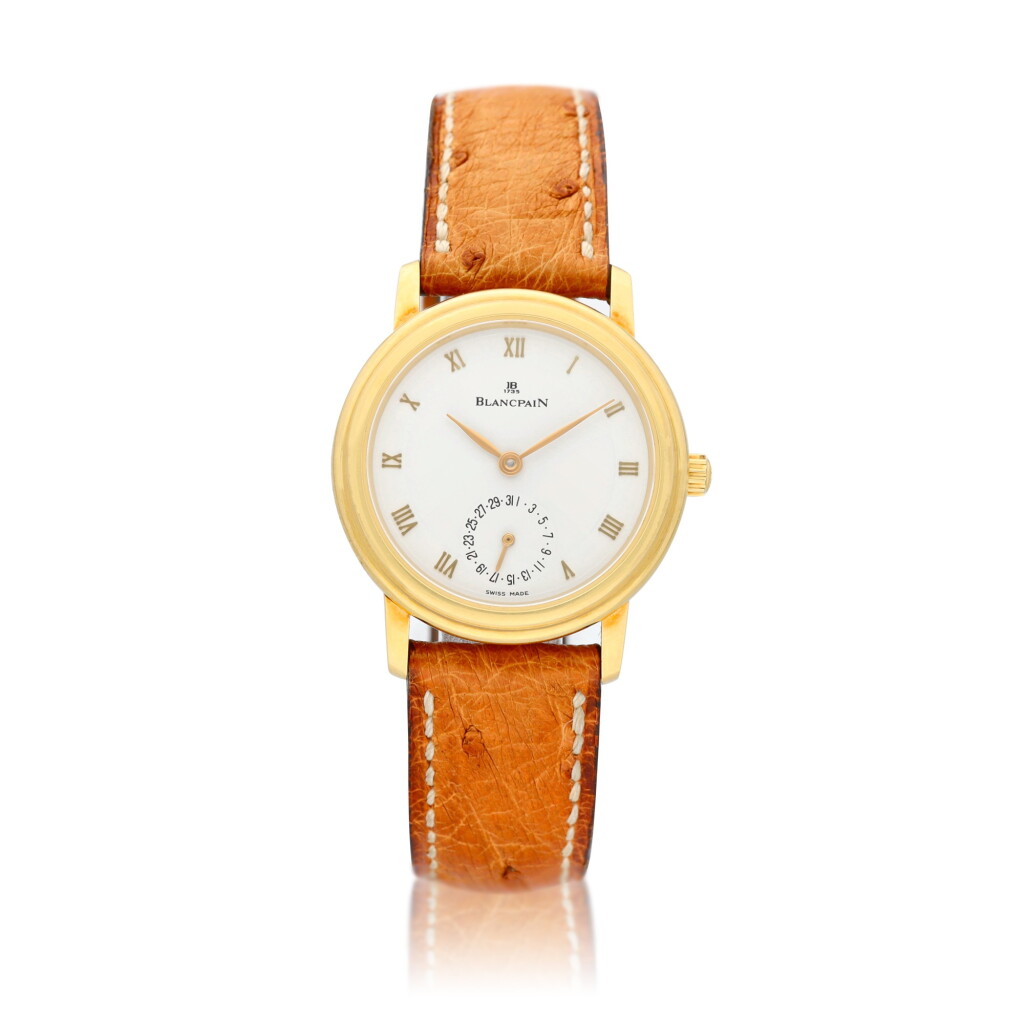 View full screen - View 1 of Lot 90. Villeret An 18k yellow gold automatic wristwatch with date, circa 1995.