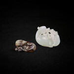 A greyish-celadon jade mythical beast, Ming dynasty, and a white jade duck, Qing dynasty, 18th - 19th century 明 灰青玉瑞獸 及 清十八至十九世紀 白玉寶鴨
