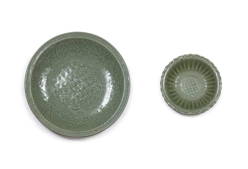 View full screen - View 1 of Lot 151. Two carved and molded Longquan celadon dishes, Ming dynasty | 明 龍泉窰青釉折沿盤二件.