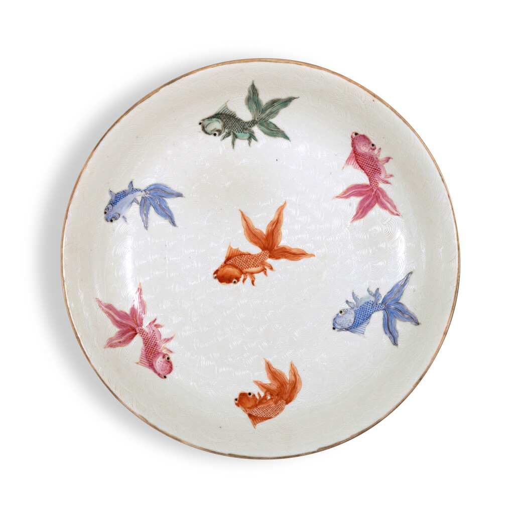 View full screen - View 1 of Lot 990. A famille-rose sgraffiato 'goldfish' dish, Late Qing dynasty | 清末 白地軋道粉彩金魚紋盤.