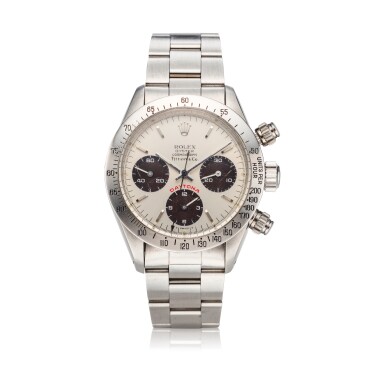 View full screen - View 1 of Lot 217. Reference 6265 'Big Red' Daytona Retailed by Tiffany & Co.: A stainless steel chronograph wristwatch with bracelet, Circa 1979.