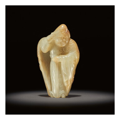 View full screen - View 1 of Lot 207. AN EXCEEDINGLY RARE WHITE AND RUSSET JADE CARVING OF A FOREIGNER, TANG DYNASTY.