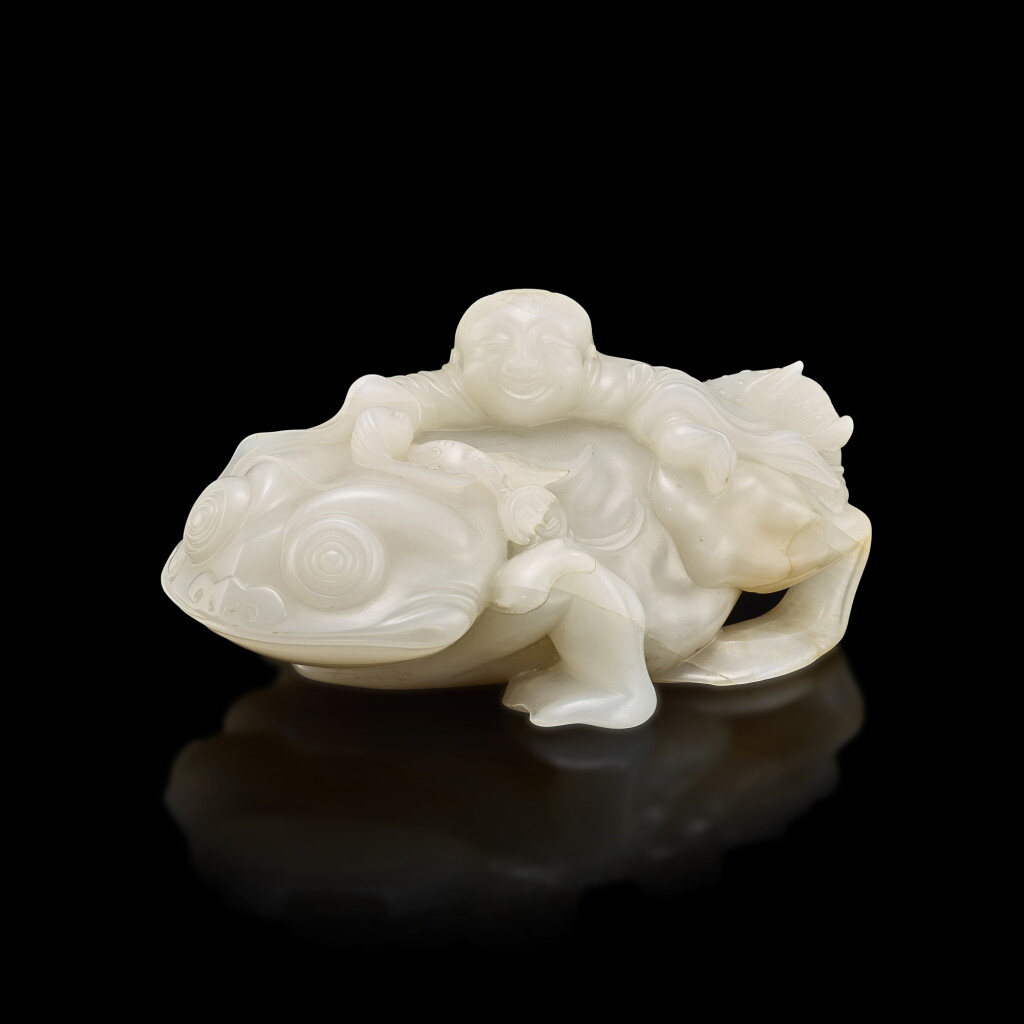 View full screen - View 1 of Lot 3008. A white jade 'Liu Hai and toad' group, 17th century 十七世紀 白玉劉海戲蟾.