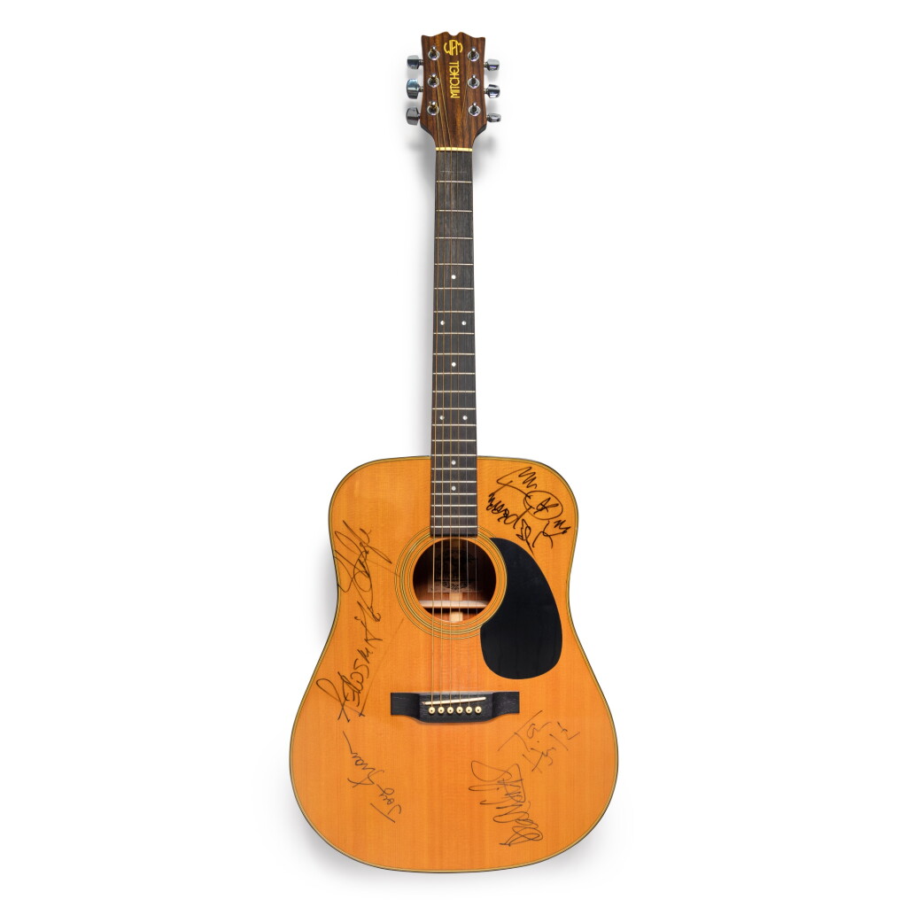 View full screen - View 1 of Lot 68. Aerosmith | Acoustic guitar, signed by the full band.