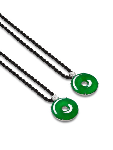 View full screen - View 1 of Lot 1659. A VERY FINE AND RARE PAIR OF JADEITE AND DIAMOND PENDENT NECKLACES | 非常珍美罕有 天然翡翠雕「平安扣」 配 鑽石 項鏈一對.