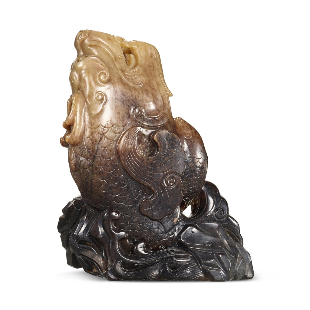 View full screen - View 1 of Lot 3701. A pale celadon and brown jade 'dragon carp' vase, Qing dynasty, 17th - 18th century | 清十七至十八世紀 青玉魚龍花插.