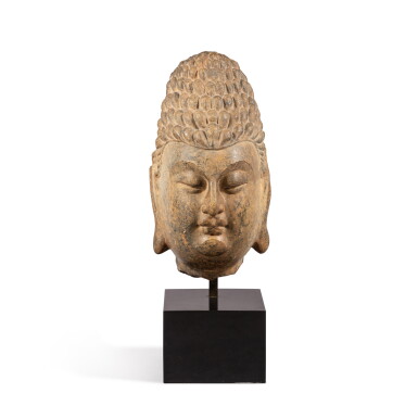 View full screen - View 1 of Lot 89. A monumental stone head of a Boddhisattva Possibly Song dynasty | 或宋 石雕菩薩首像.