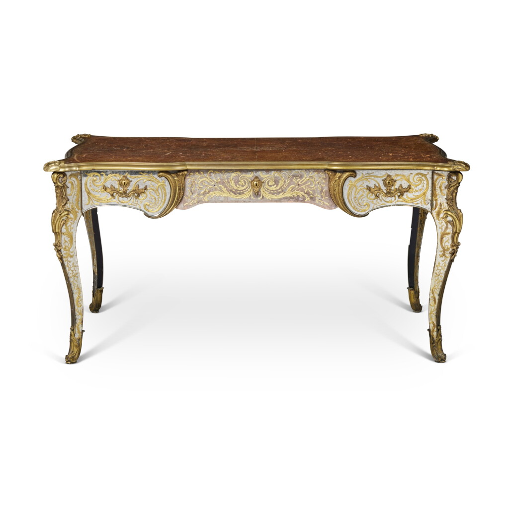 View full screen - View 1 of Lot 98. A Louis XV Style Gilt-Bronze Mounted Verre Églomisé Mirrored and Leather Lined Bureau Plat, Probably by Maison Jansen, Circa 1938.