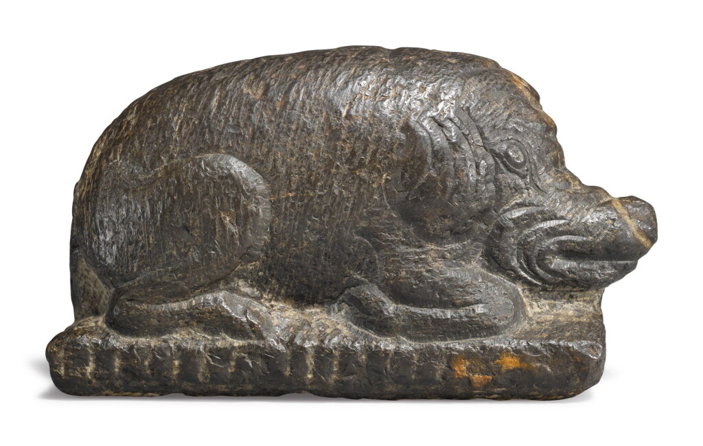 View full screen - View 1 of Lot 1102. AN UNUSUAL STONE FIGURE OF A RECUMBENT BOAR.