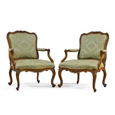 View full screen - View 1 of Lot 37. A pair of Louis XV carved walnut fauteuils en cabriolet, circa 1760.