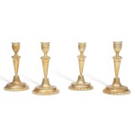 A Set of Four 18 Karat Gold Candlesticks, 20th Century