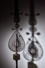 A monumental cut-steel processional standard ('alam), signed by Mir Taj al-Din, Persia, Safavid, dated 1122 AH/1710-11 AD