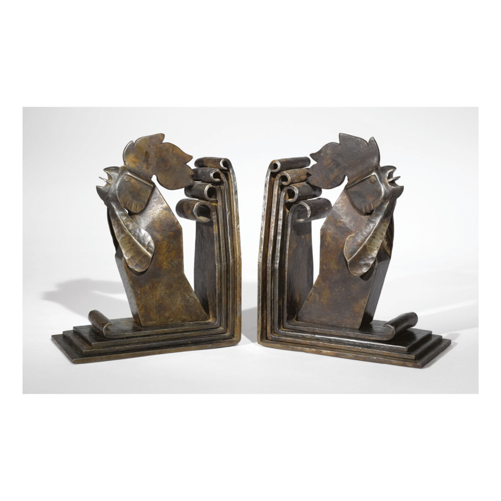 View full screen - View 1 of Lot 135. EDGAR BRANDT | PAIR OF "ROOSTER" BOOKENDS.