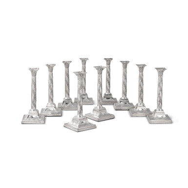 View full screen - View 1 of Lot 241. An English set of ten silver-plated candlesticks, English, probably circa 1900 | Ensemble de dix grands flambeaux en métal argenté, Angleterre, probablement vers 1900.