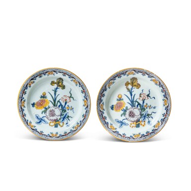 View full screen - View 1 of Lot 311. A pair of Dutch Delft polychrome large chargers, circa 1770-75.