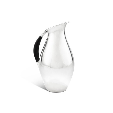 View full screen - View 1 of Lot 57. A Danish silver pitcher, Georg Jensen after Johan Rohde's design, Copenhagen, after 1945 | Pichet en argent par Georg Jensen d'après Johan Rohde, Copenhague, après 1945.