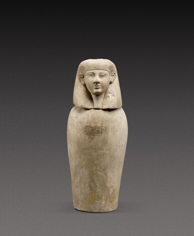 View full screen - View 1 of Lot 145. An Egyptian Limestone Canopic Jar, 19th Dynasty, 1292-1190 B.C..