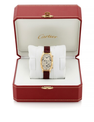 View full screen - View 1 of Lot 131. TONNEAU DUAL TIME ZONE, REFERENCE 078-91 YELLOW GOLD TONNEAU-SHAPED DUAL TIME ZONE WRISTWATCH (OROLOGIO DA POLSO IN ORO GIALLO MODELLO 'TONNEAU' CON DOPPIO FUSO ORARIO) | CARTIER.