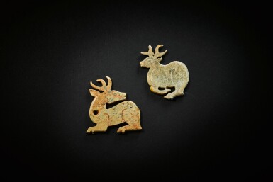 View full screen - View 1 of Lot 3792. Two calcified jade 'deer' plaques, Western Zhou dynasty | 西周 玉鹿兩件.