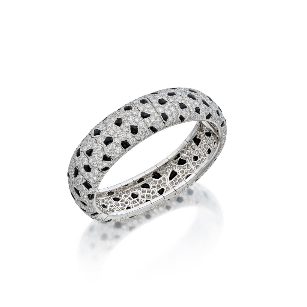 View full screen - View 1 of Lot 90. Diamond and Onyx 'Panthère' Bracelet, France.