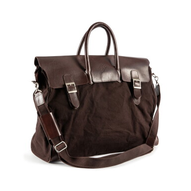 View full screen - View 1 of Lot 81. A brown leather and canvas traveling bag with copper hardware.