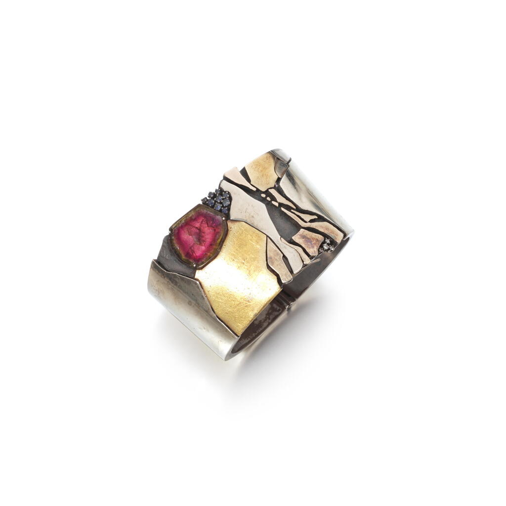 View full screen - View 1 of Lot 1182. Silver, silver-gilt, gem set and diamond bangle, circa 1970.