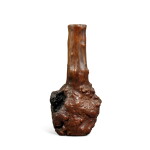 A rootwood vase, Qing dynasty | 清 樹根雕花瓶