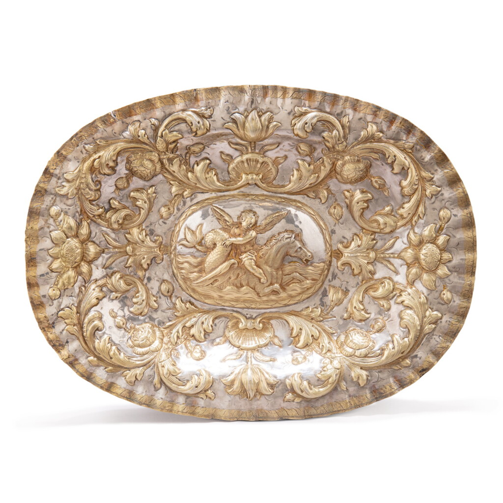 View full screen - View 1 of Lot 277. A rare parcel-gilt silver salver, Mokejev, Moscow, 1721-22.