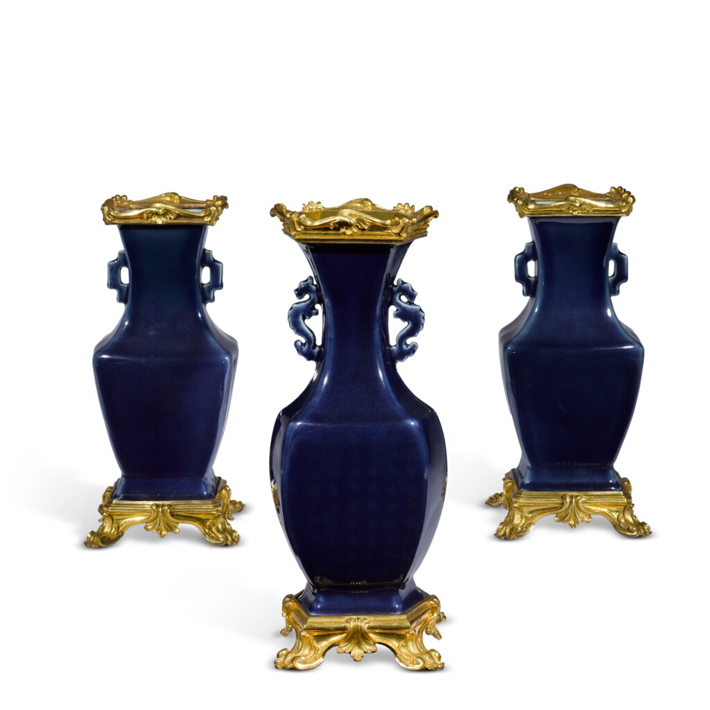 View full screen - View 1 of Lot 10. A set of gilt-bronze mounted three-piece porcelain vase garniture, the porcelain Qianlong period (1736-1795), the mounts Louis XV.
