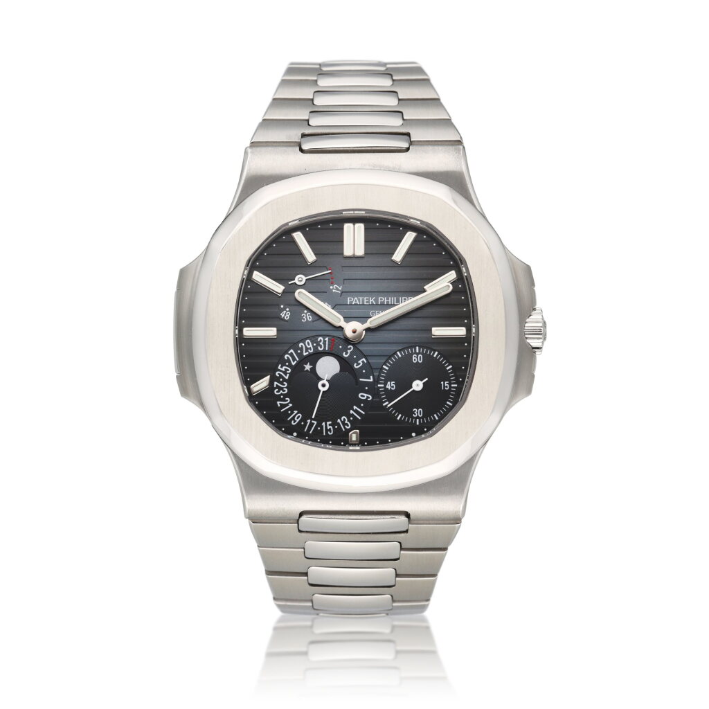 View full screen - View 1 of Lot 82. Reference 5712 Nautilus | A stainless steel bracelet watch with date, moon phases and power reserve indication, Circa 2015.