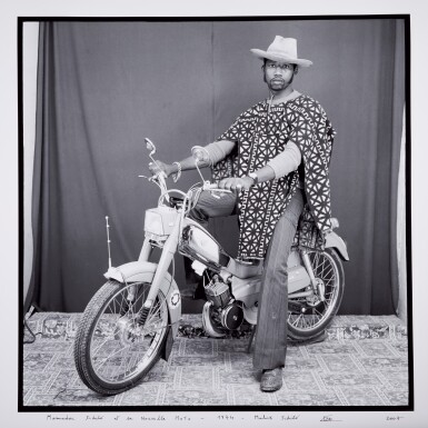 View full screen - View 1 of Lot 51. Mamadou Sidibé et sa nouvelle moto.