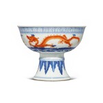 An iron-red and underglaze-blue 'dragon' stemcup, Qing dynasty, 19th century