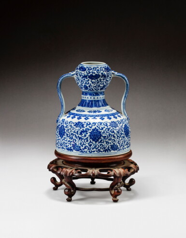 View full screen - View 1 of Lot 158. A blue and white double-gourd and ‘ruyi’ handled ‘lotus’ flask, Republican period | 民國 青花纏枝瑞芝蓮紋雙耳葫蘆尊.
