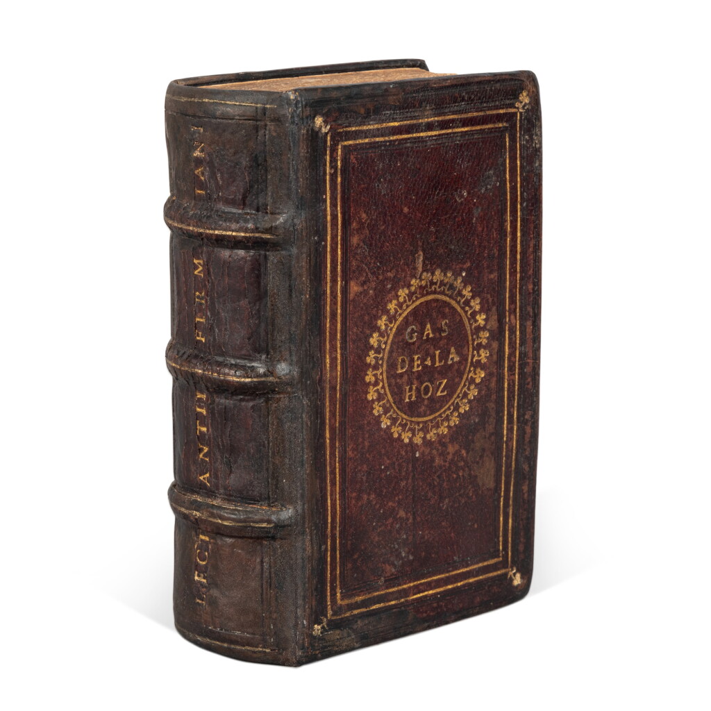 View full screen - View 1 of Lot 825. Lactantius, Institutiones Divinae, Venice, Paolo Manuzio & Heirs of Torresano, 1535, Roman dark brown morocco, ca. 1540 for Gaspar de la Hoz.