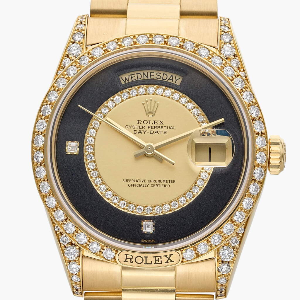 View full screen - View 1 of Lot 124. Reference 18138 Day-Date | A yellow gold and diamond-set automatic wristwatch with day, date and bracelet, Circa 1986.