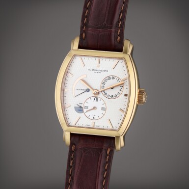 View full screen - View 1 of Lot 398. Reference 47400 Malte | A pink gold automatic tonneau shaped dual time wristwatch with date, Day/Night indication, and power reserve indication, Circa 2010.