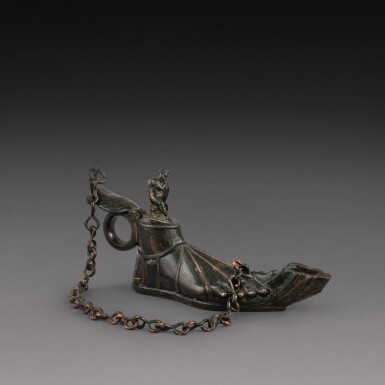 View full screen - View 1 of Lot 26. A Roman Bronze Oil Lamp, circa 2nd Century A.D..