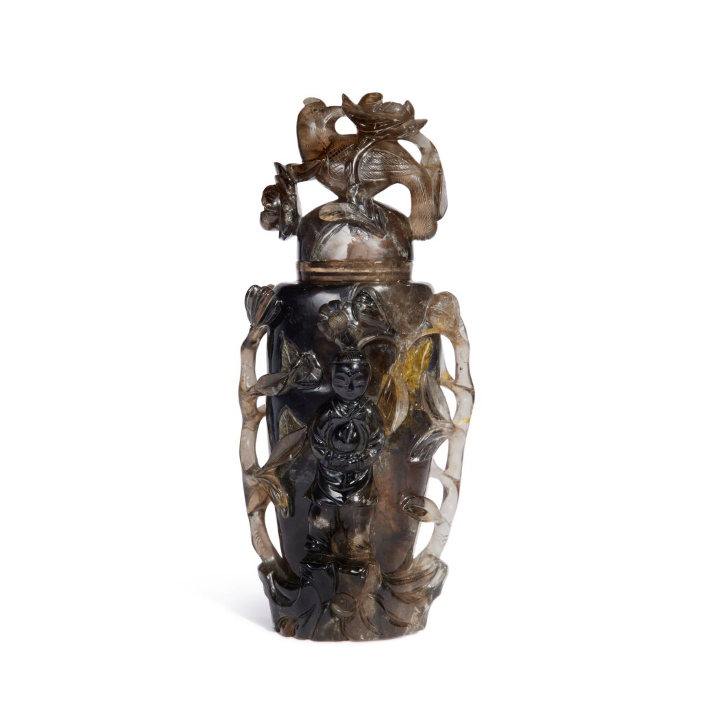 View full screen - View 1 of Lot 777. A smoky quartz 'boy and bird' vase and cover, 19th / 20th century | 十九 / 二十世紀 茶晶雕喜上眉梢金童賀壽圖蓋瓶.