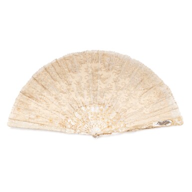 View full screen - View 1 of Lot 1110. A lace and mother-of-pearl fan by Spaulding, 1890-1900.