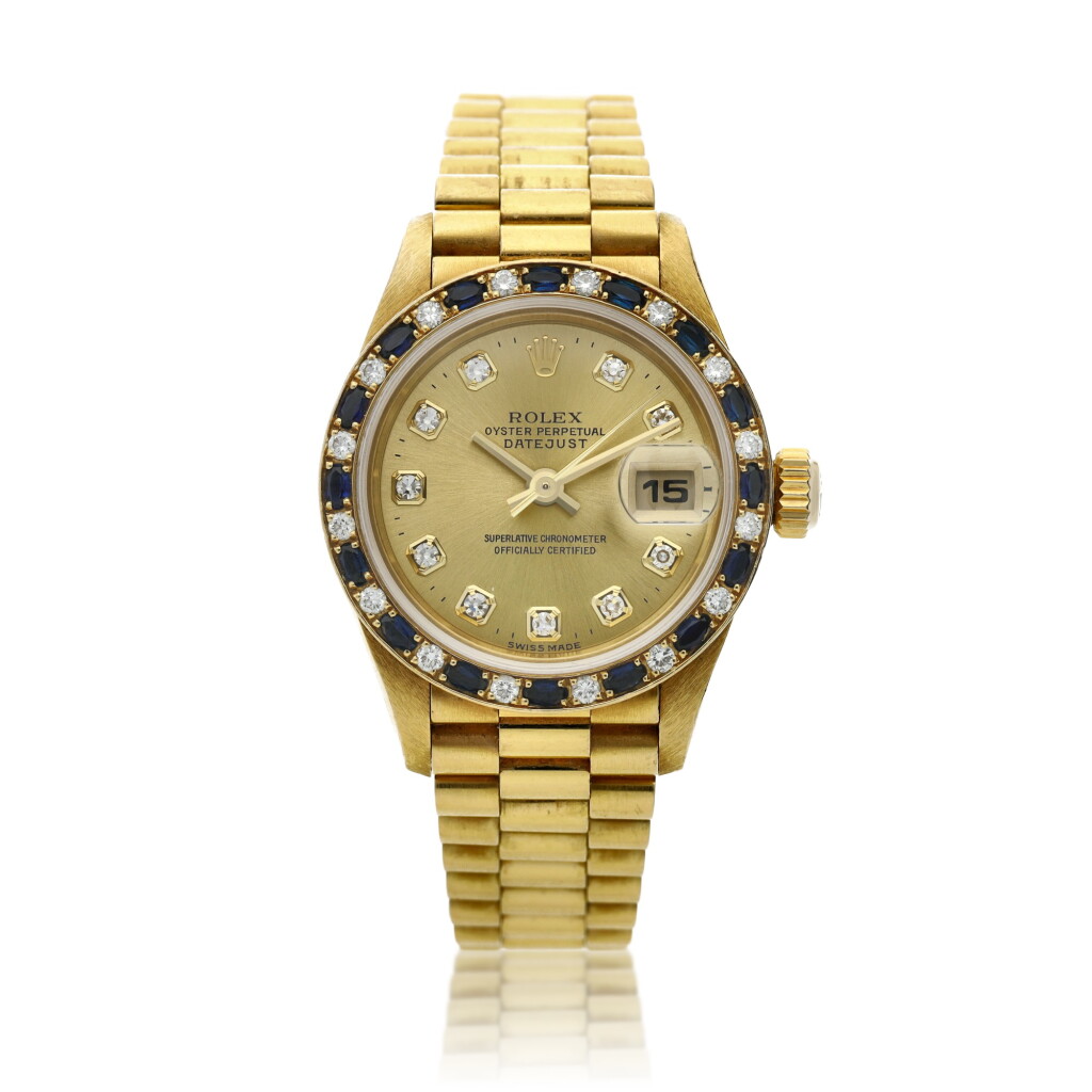 View full screen - View 1 of Lot 65. Reference 79198 Datejust A yellow gold, diamond and sapphire set wristwatch with date and bracelet, Circa 1998.