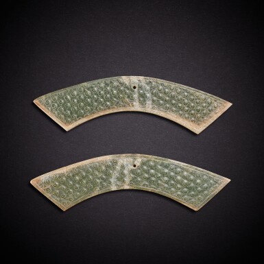 View full screen - View 1 of Lot 7872. A pair of inscribed celadon jade pendants, huang, Western Han dynasty | 西漢 青玉穀紋帶銘璜一對.