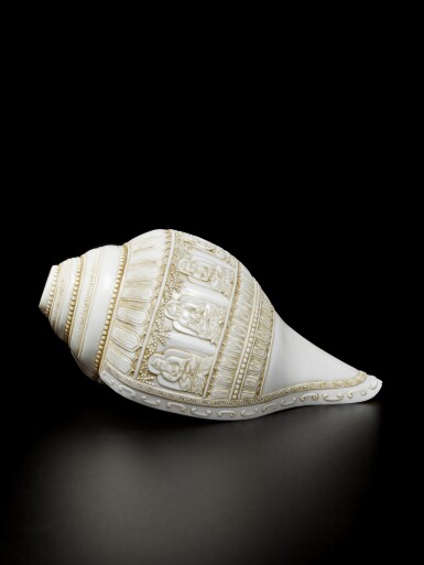 View full screen - View 1 of Lot 310. A rare and finely-carved ritual conch trumpet, Qing dynasty, Qianlong period.