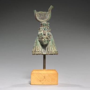 View full screen - View 1 of Lot 62. AN EGYPTIAN BRONZE HEAD OF THE GODDESS ISIS, 21ST/25TH DYNASTY, 1075-656 B.C..
