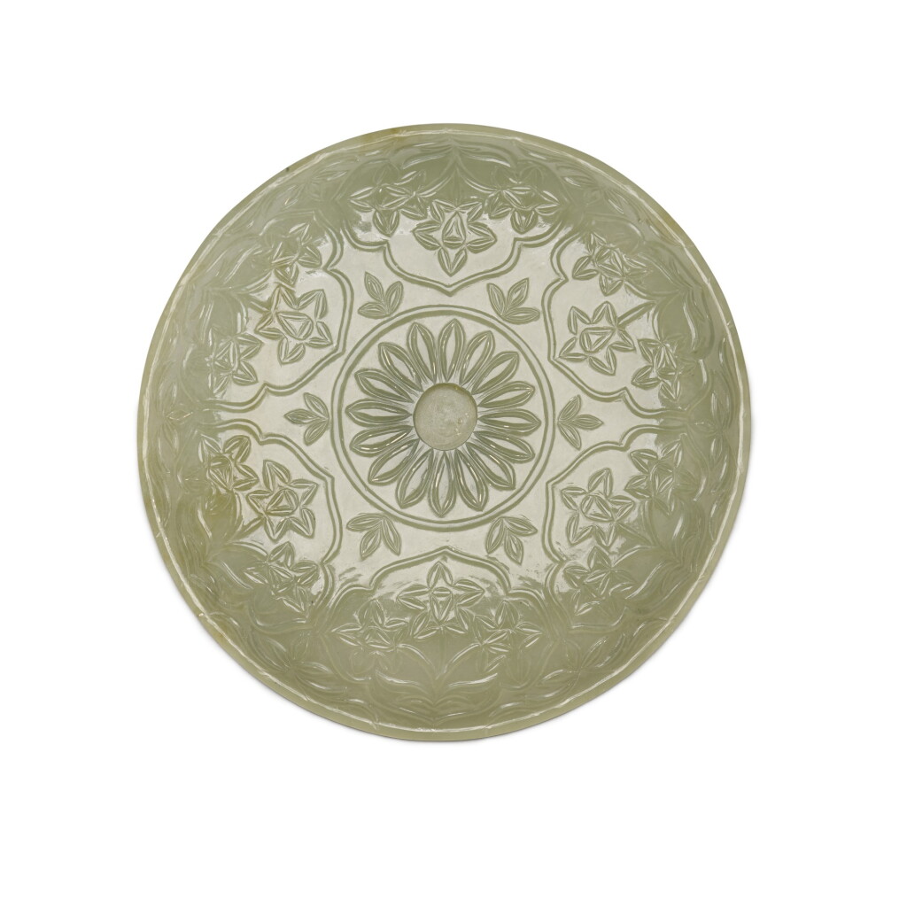 View full screen - View 1 of Lot 69. A mughal-style celadon jade cover, Qing dynasty, 18th century | 清十八世紀 青玉痕都斯坦式蓋.