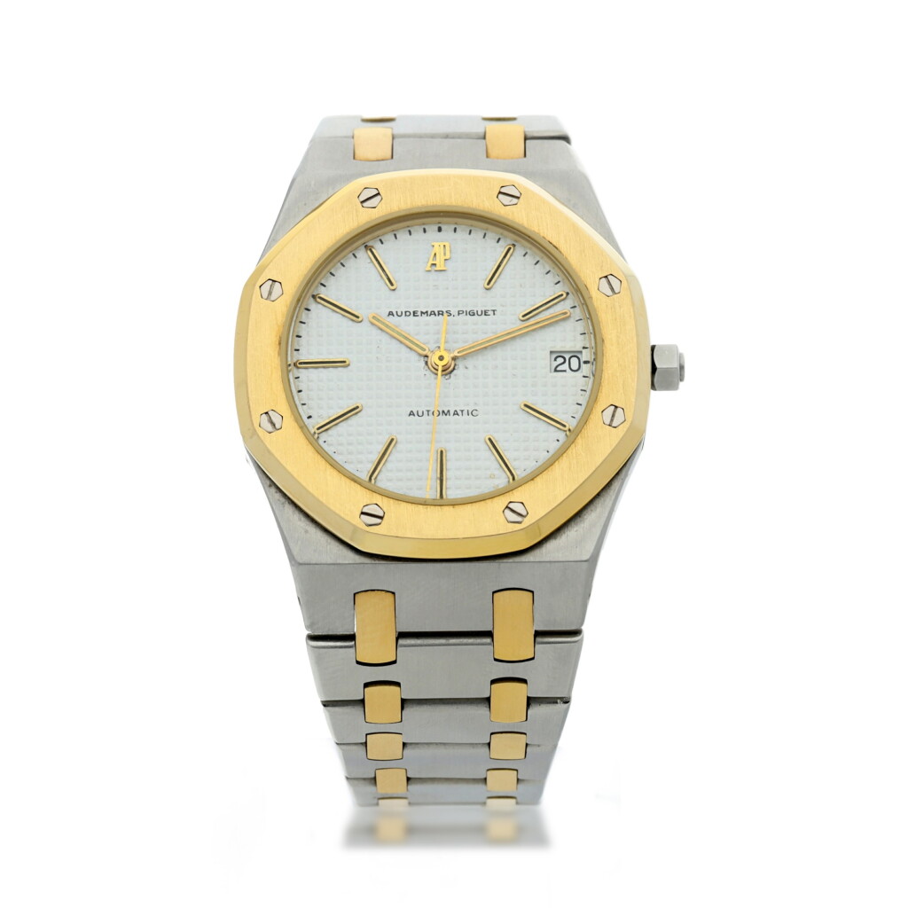 View full screen - View 1 of Lot 6. AUDEMARS PIGUET | ROYAL OAK A YELLOW GOLD AND STAINLESS STEEL AUTOMATIC WRISTWATCH WITH DATE AND BRACELET, CIRCA 1985.