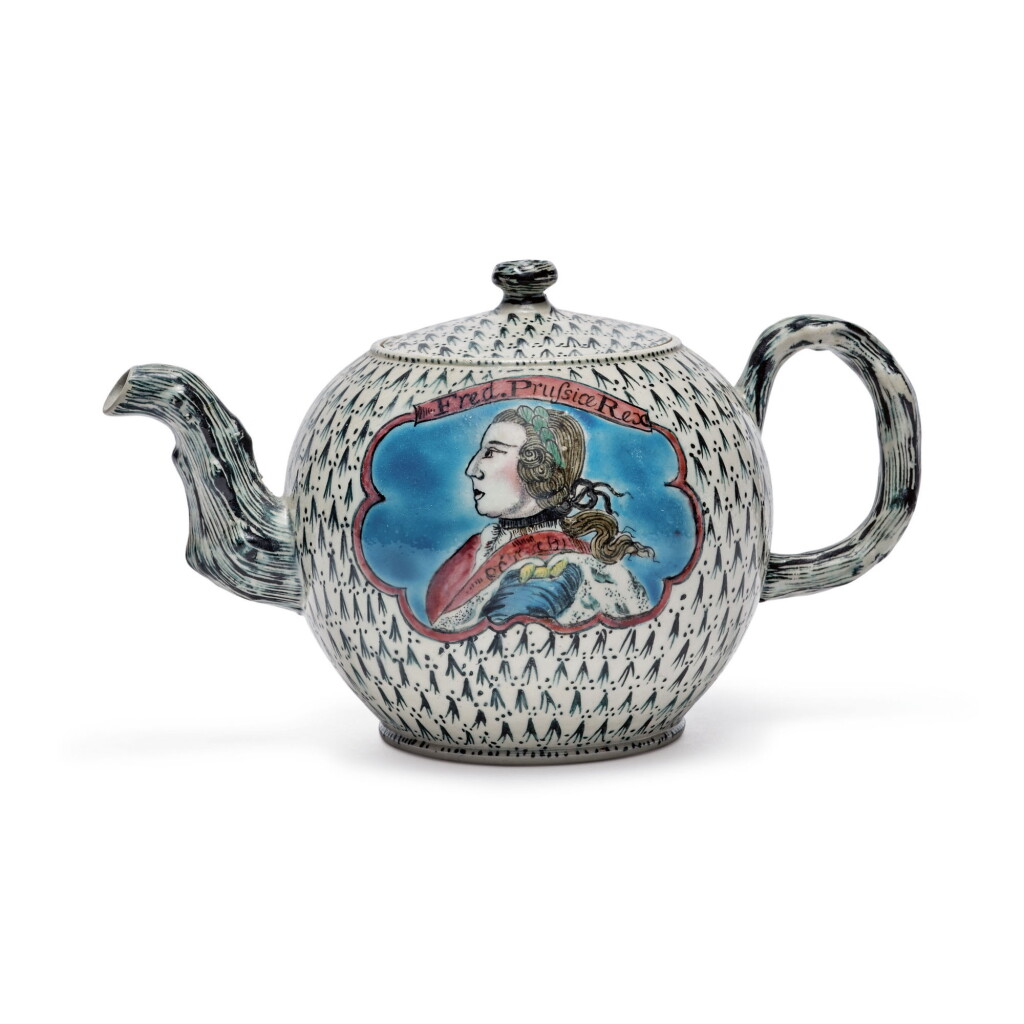 View full screen - View 1 of Lot 45. A STAFFORDSHIRE ENAMELLED SALT-GLAZED STONEWARE ‘KING OF PRUSSIA' TEAPOT AND COVER CIRCA 1757 .