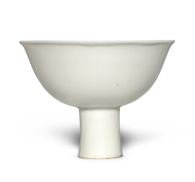 View full screen - View 1 of Lot 235. A white-glazed stem bowl, Ming dynasty, 15th century | 明十五世紀 白釉高足盌.